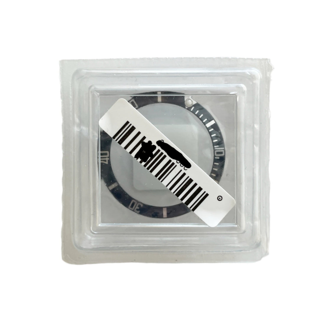 New Rolex Sea-Dweller 16660 black bezel insert part B315-16660-181 New Rolex Sea-Dweller 16660 black bezel insert part B315-16660-181